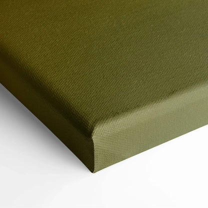 Close-up of olive green stretched canvas corner with visible texture for wall art decor.