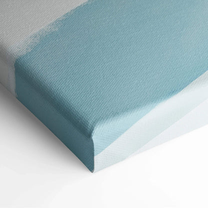 Light blue and white canvas edge with visible fabric texture on a stretched canvas wall art piece.