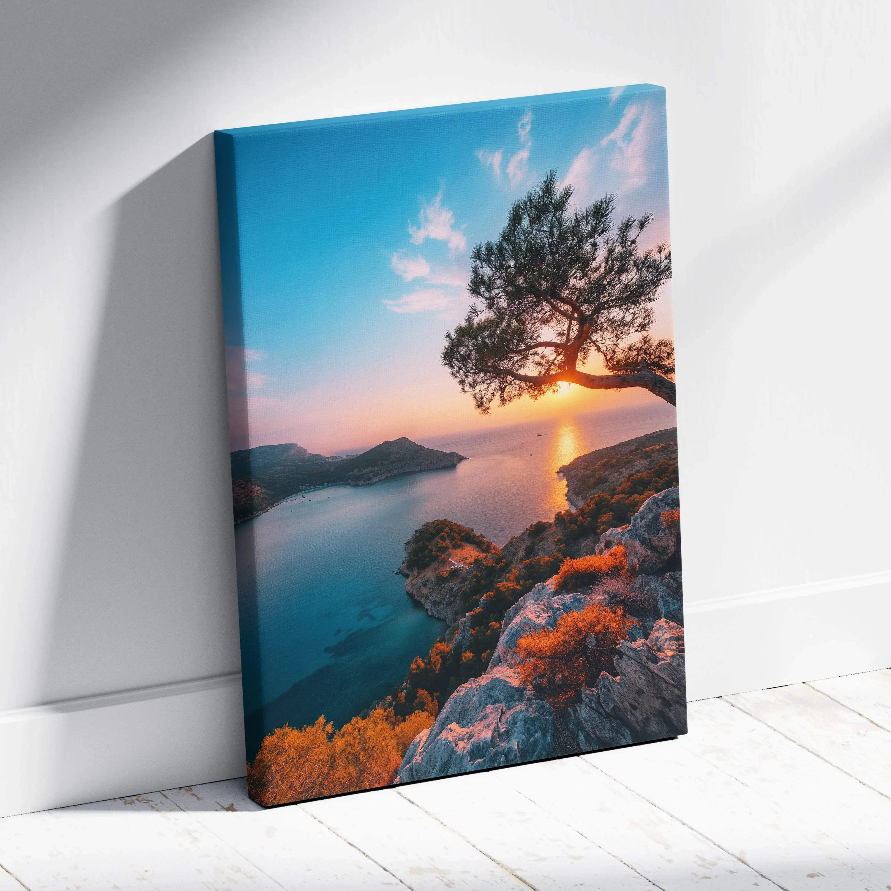 Canvas wall art featuring a vibrant beach sunset with orange and blue hues and silhouetted coastal trees.