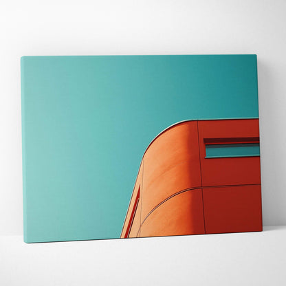 Canvas wall art featuring a vibrant orange curved building corner against a clear turquoise sky.