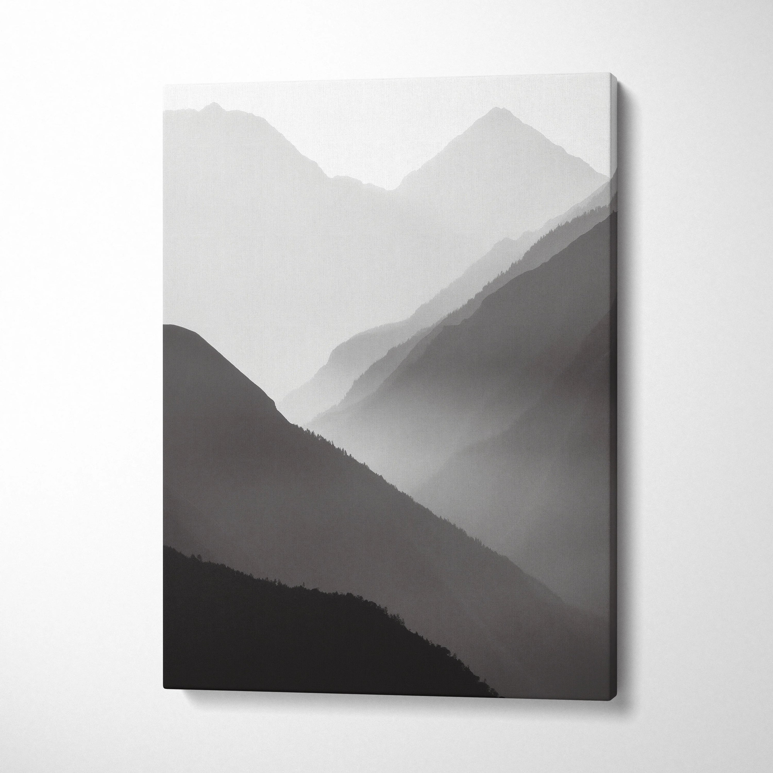 Minimalist black and gray mountain landscape canvas wall art with misty layers for modern decor.