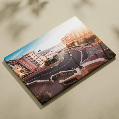 Canvas wall art featuring a detailed digital view of Monaco F1 track's hairpin turn with surrounding buildings in warm.