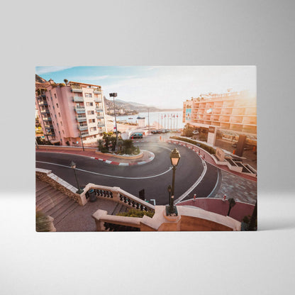 Canvas wall art of Monaco F1 hairpin turn with urban buildings and warm sunlight.