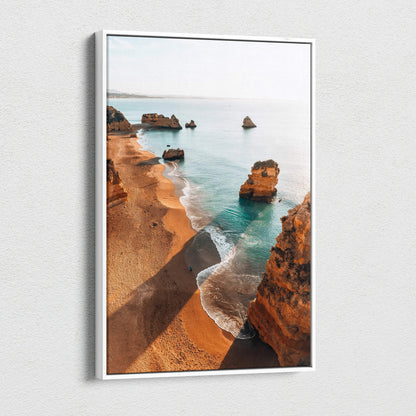 Coastal beach scene canvas art with golden cliffs and turquoise water, framed wall art.