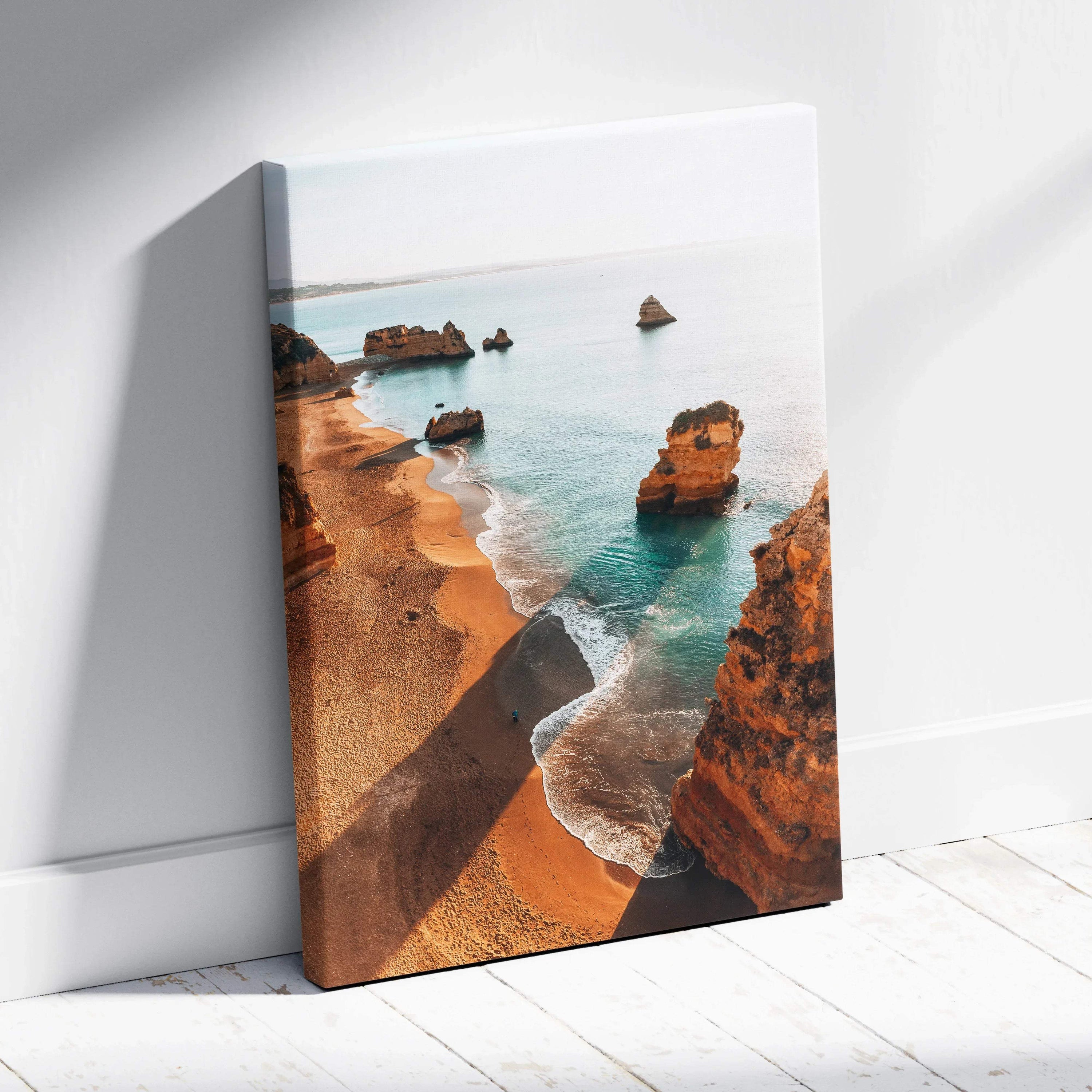 Canvas wall art featuring a serene beach scene with golden cliffs and turquoise water.