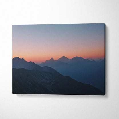 Canvas print of mountain landscape at dusk in lilac, coral, blue hues
