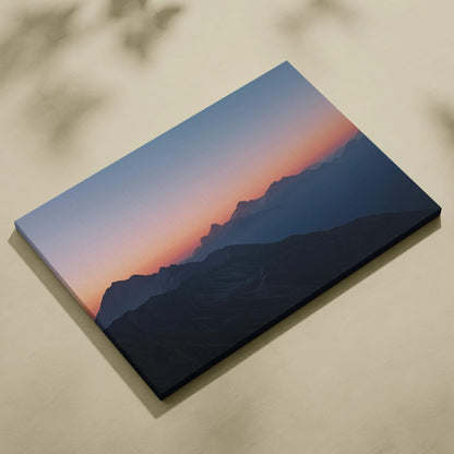 Canvas print of mountain landscape at dusk in lilac, coral, blue hues