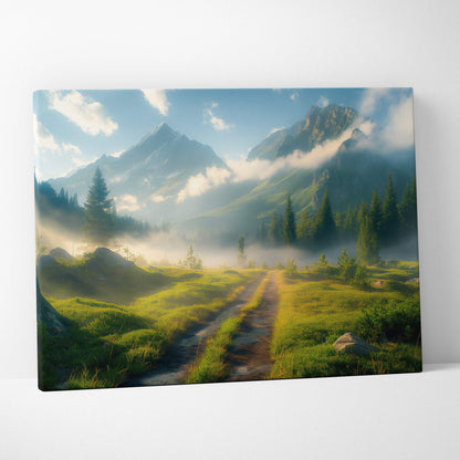Canvas print of misty mountain meadow in morning fog with sunlit peaks