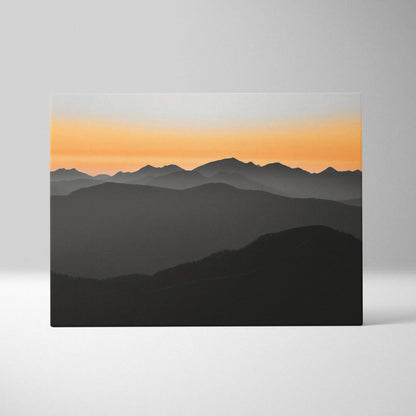 Minimalist layered mountain landscape canvas wall art with orange to gray sunset gradient