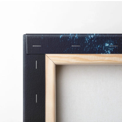 Minimalist wooden-framed canvas of navy cosmic stars and neon blue forest ring