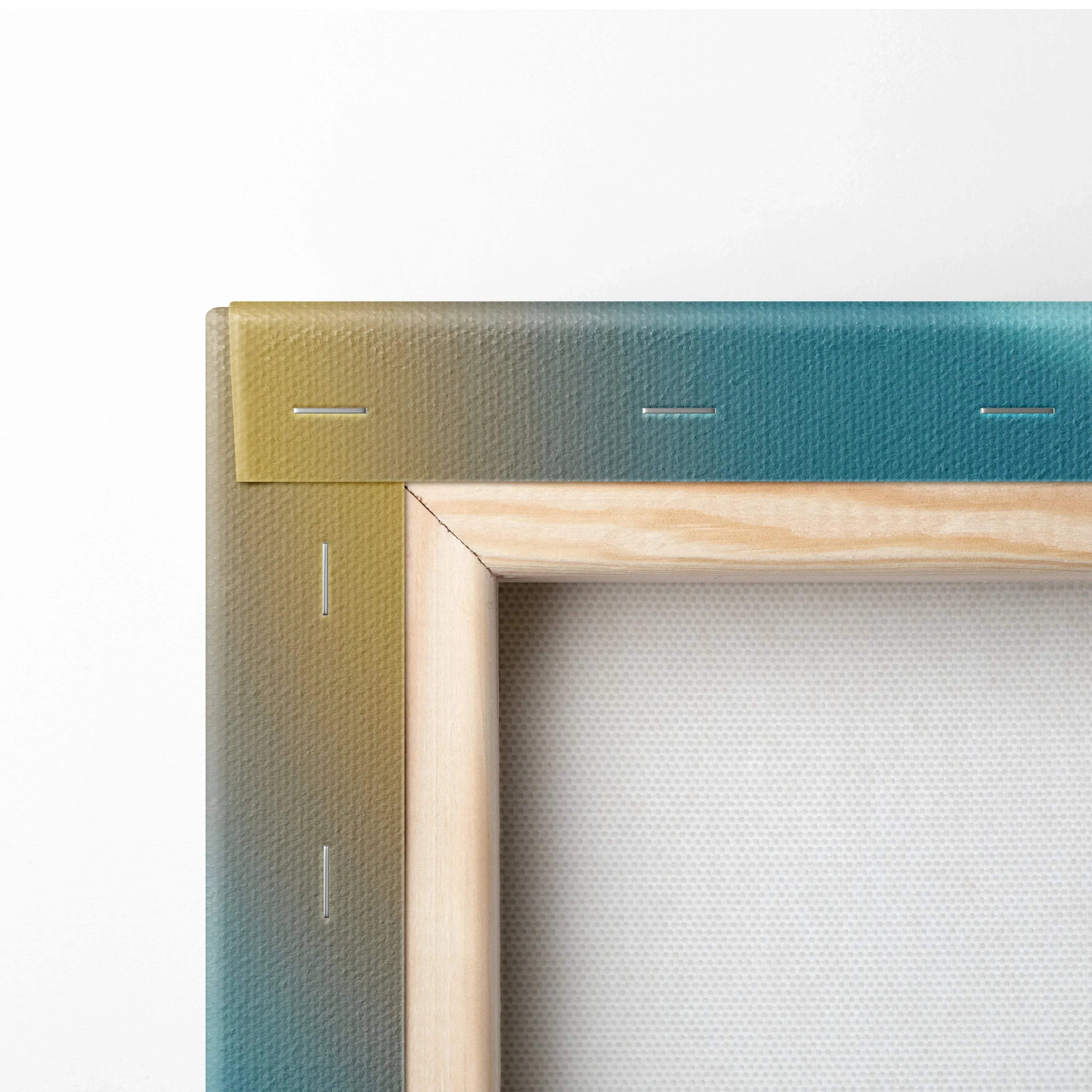 Canvas edge wrapped around wooden frame with gradient colors blending orange, yellow, and blue tones.