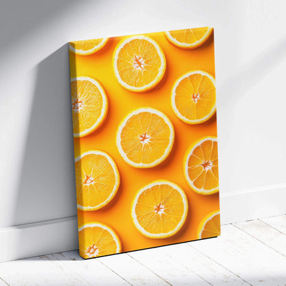 Canvas wall art featuring vibrant, fresh orange slices on bright yellow background decor.