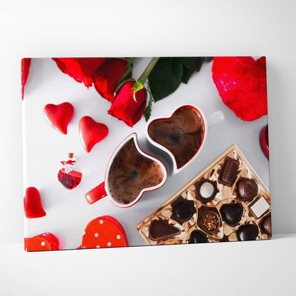 Canvas wall art featuring heart-shaped chocolates, red rose petals, and a chocolate bar with creamy textures and rich hues.