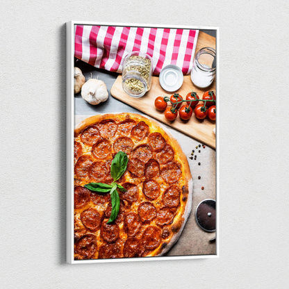 Vertical canvas wall art featuring a pepperoni pizza with basil and kitchen ingredients decor.