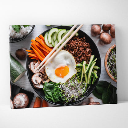 Colorful canvas wall art of a fresh food bowl with egg, vegetables, and rice for kitchen decor.