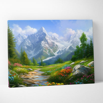 Canvas wall art featuring a vibrant floral meadow with a mountain sunset and clear blue sky decor.