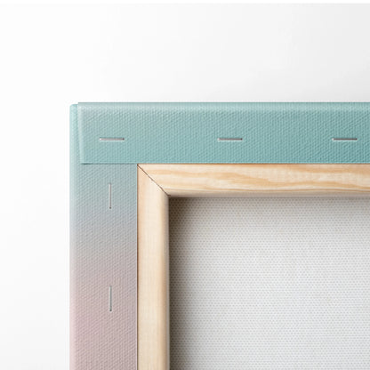 Close-up of stretched canvas with wooden frame and gradient pastel colors for wall art decor.