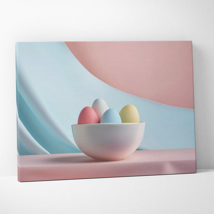 Minimalist canvas wall art with pastel Easter eggs in white bowl on soft pink and blue background decor.