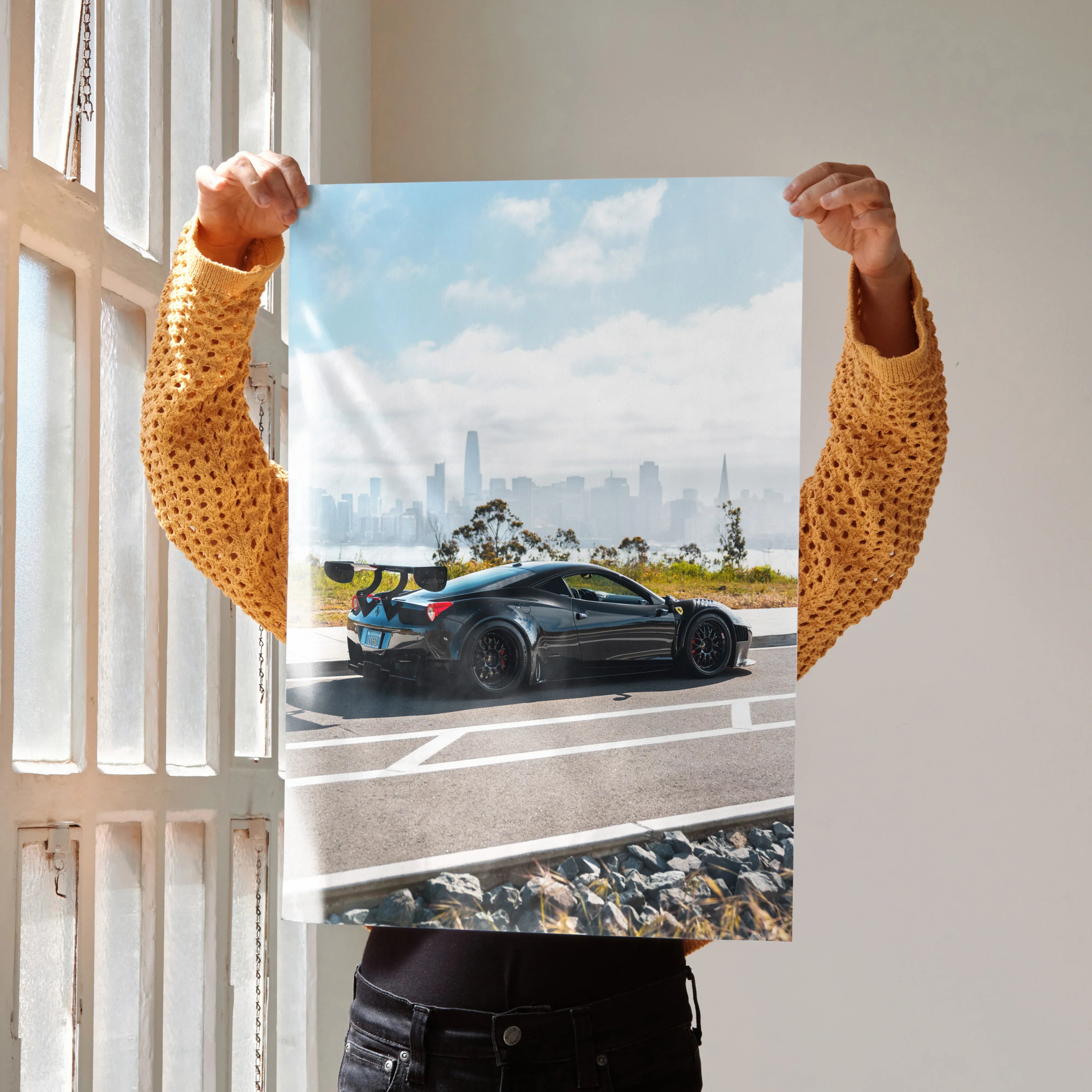 Ferrari 458 Italia GT3 black race car on road with city skyline poster wall art.