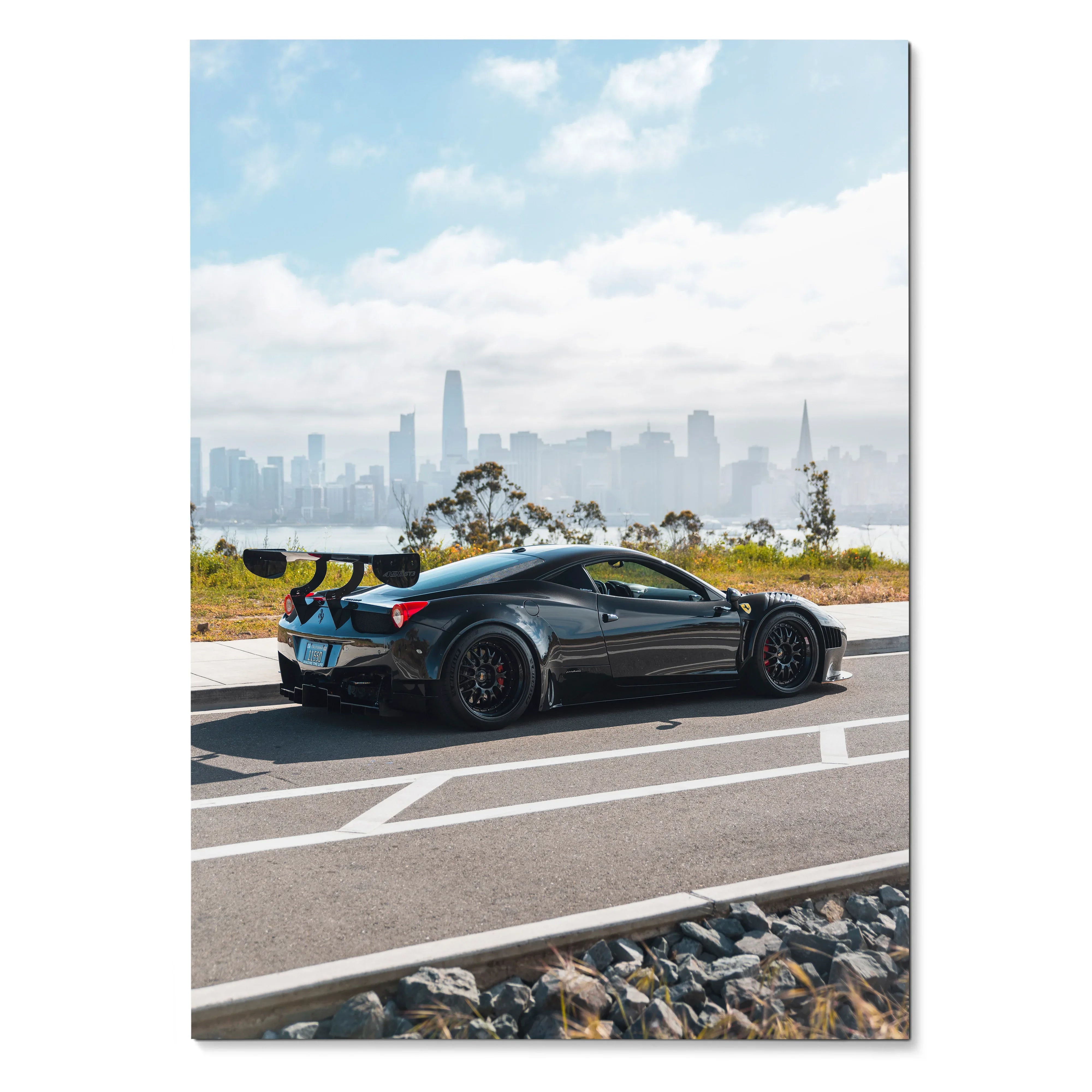 Black Ferrari 458 Italia GT3 parked on road with city skyline in background poster wall art.