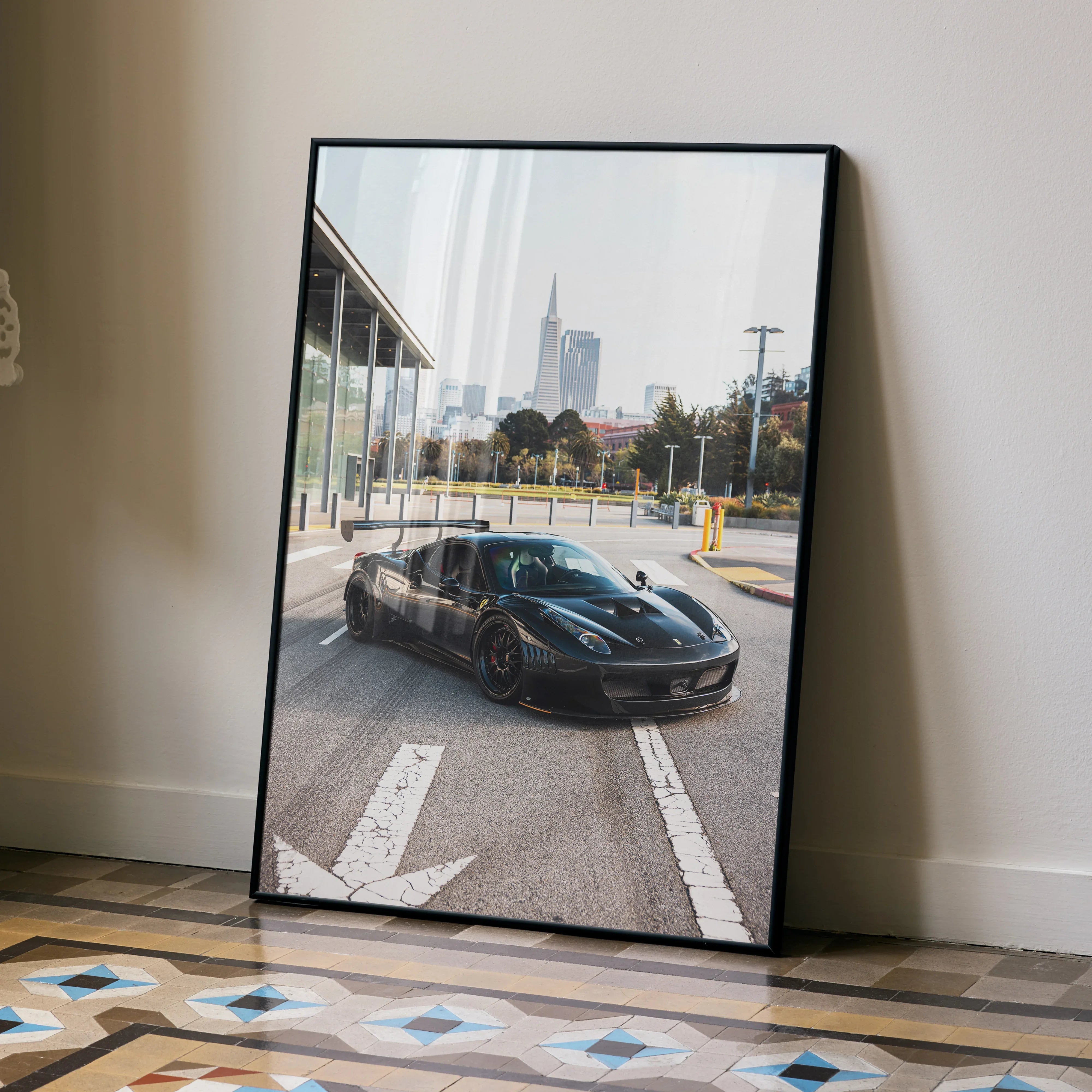 Ferrari 458 Italia GT3 black car on urban road poster wall art in black frame.