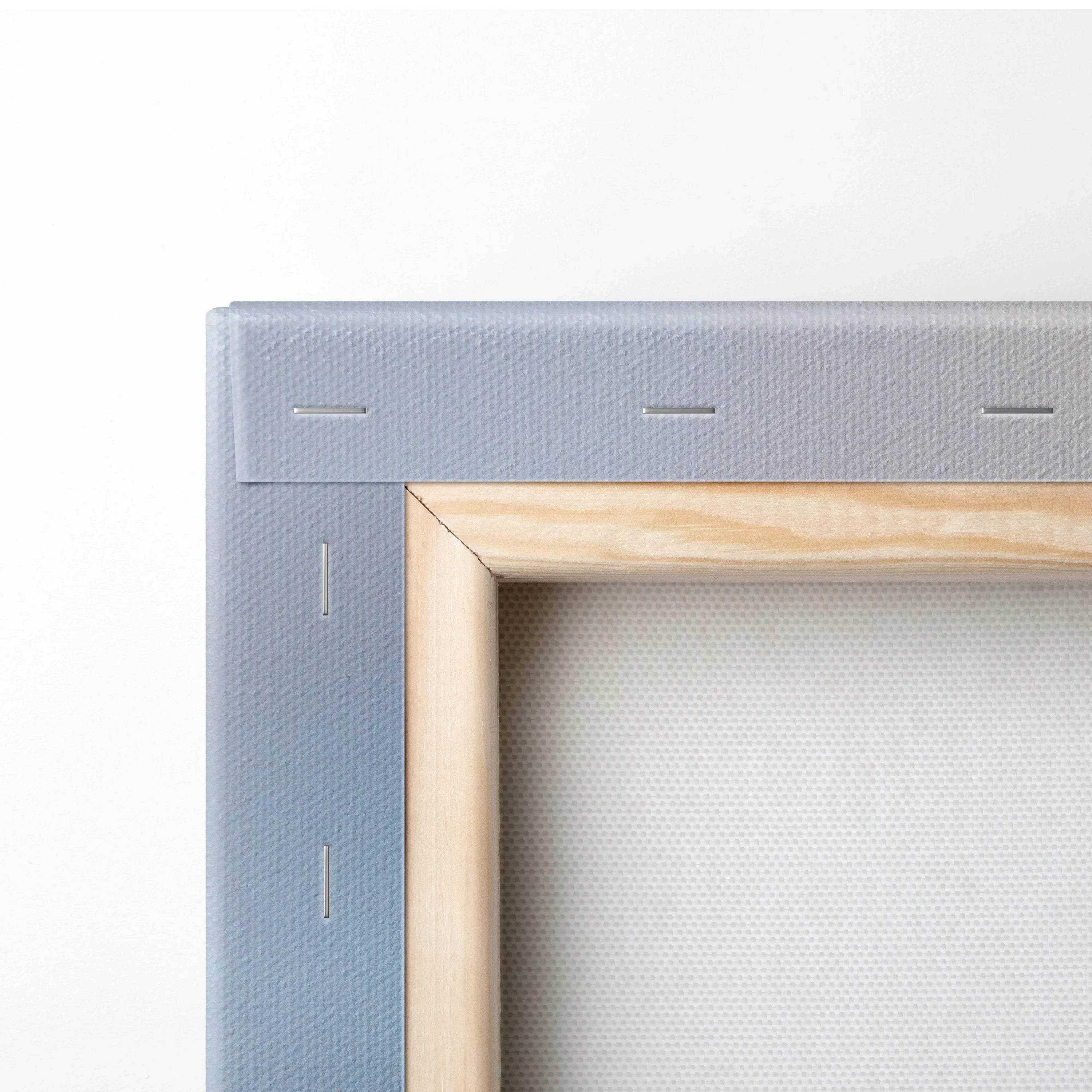 Close-up of wooden frame and linen canvas texture on vertical wall art canvas print.