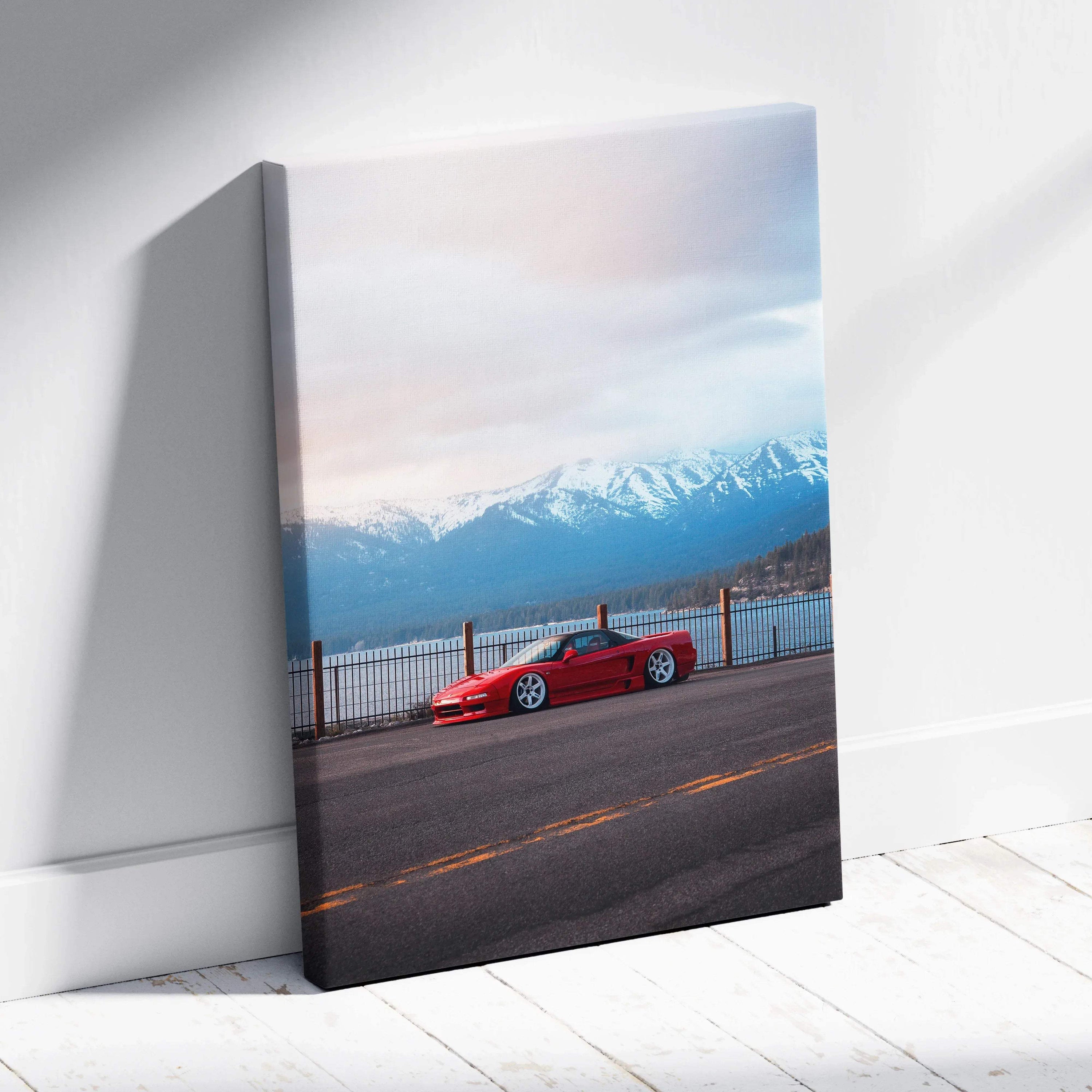 Vertical canvas wall art featuring a red Acura NSX with snow-capped mountains and sunset sky background.