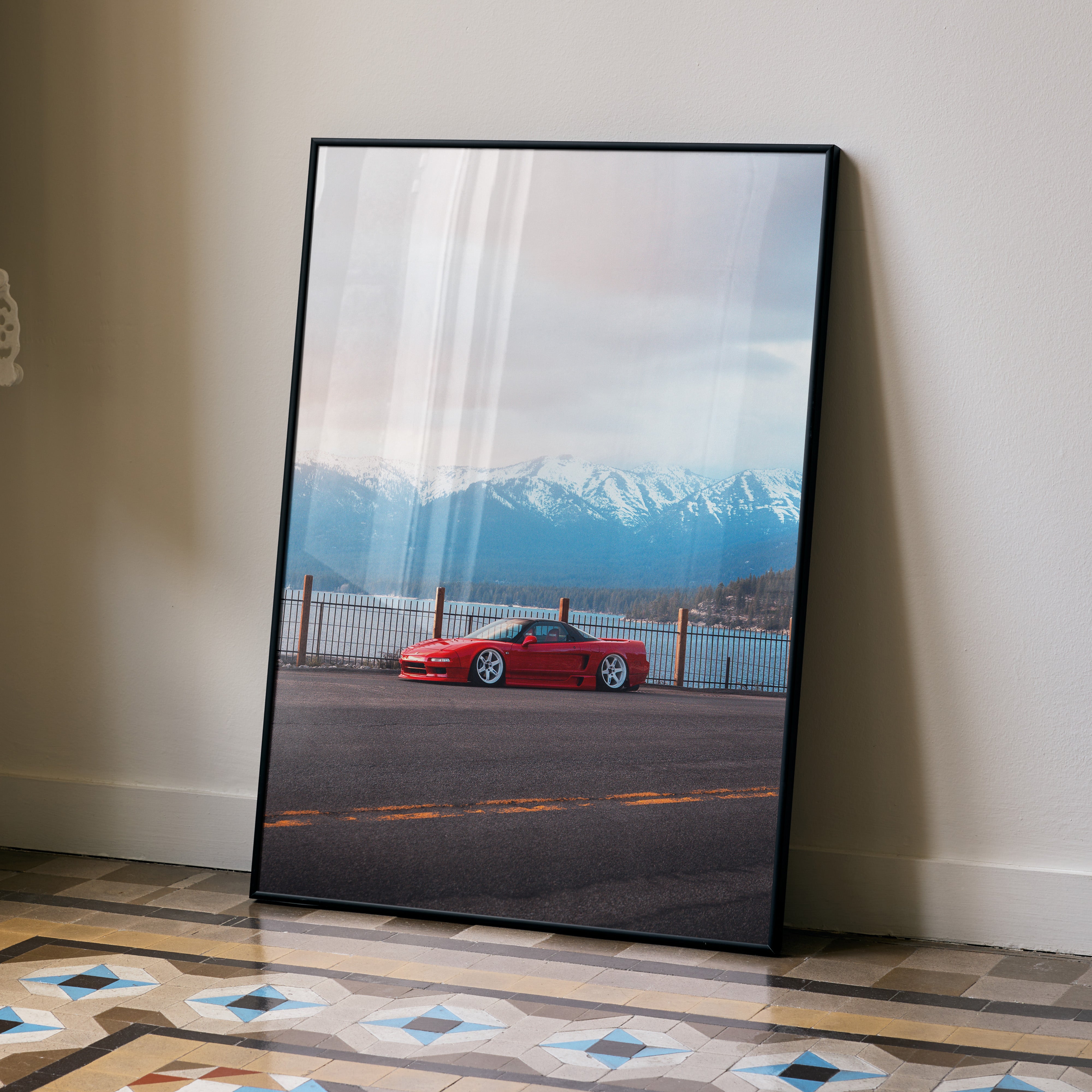 Acura NSX JDM car poster featuring a red sports car parked by a waterfront with snow-capped mountains at sunset, wall art.