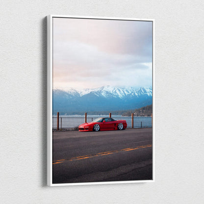 Vertical canvas wall art featuring a red Acura NSX parked by a lakeside with mountains at sunset.