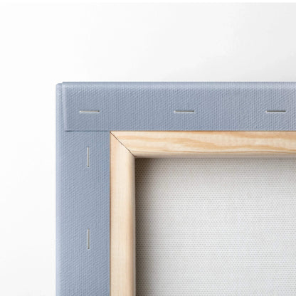 Close-up of wooden stretcher bars and canvas fabric back on vertical canvas wall art print.