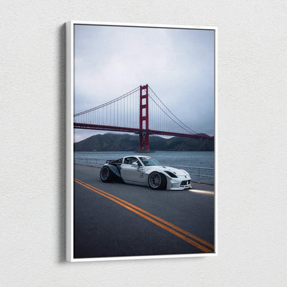 Vertical canvas art featuring a white Nissan 350z on a road with the Golden Gate Bridge in the background.