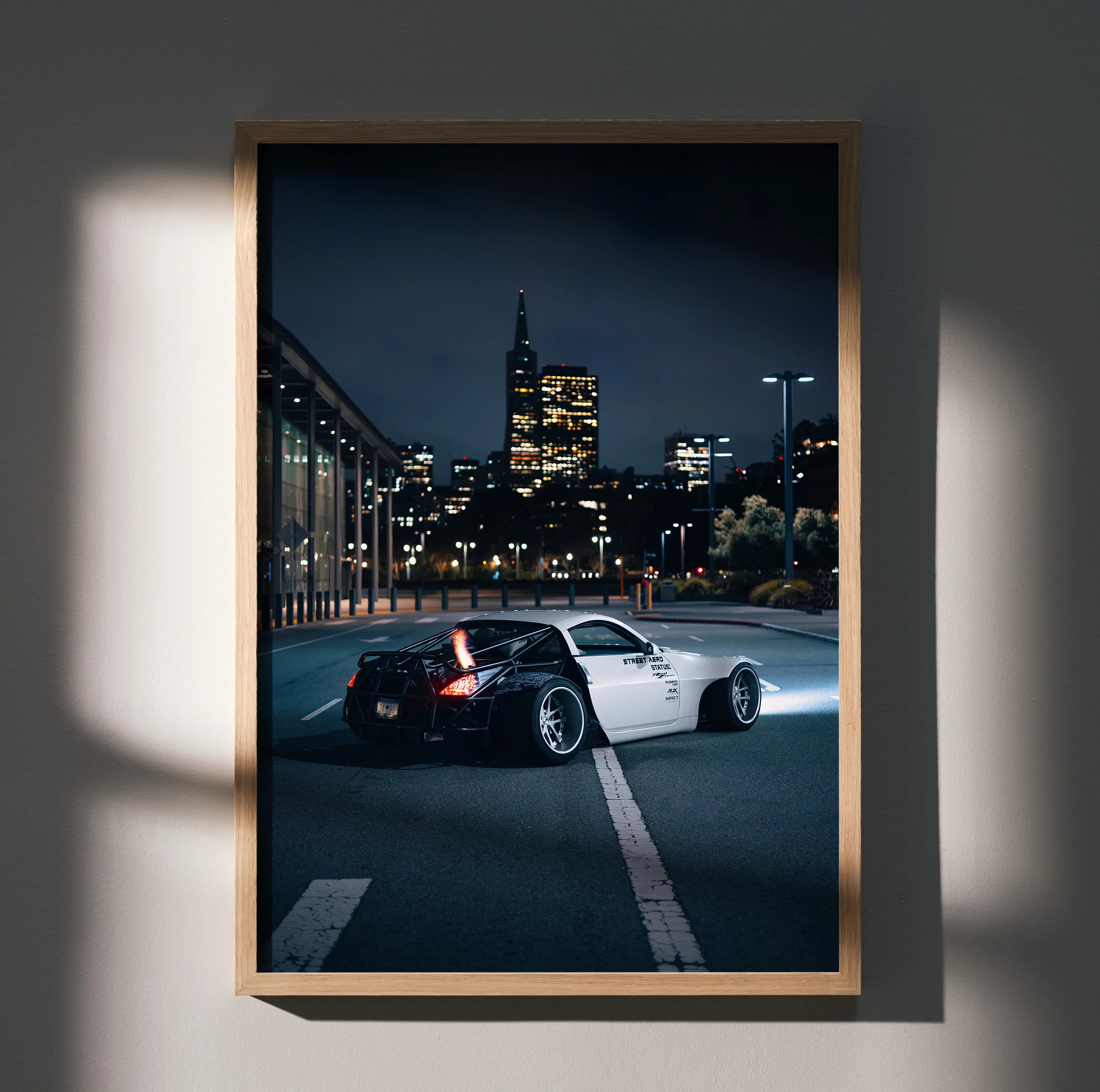 Nissan 350z JDM widebody car poster with city skyline at night, premium wall art print.