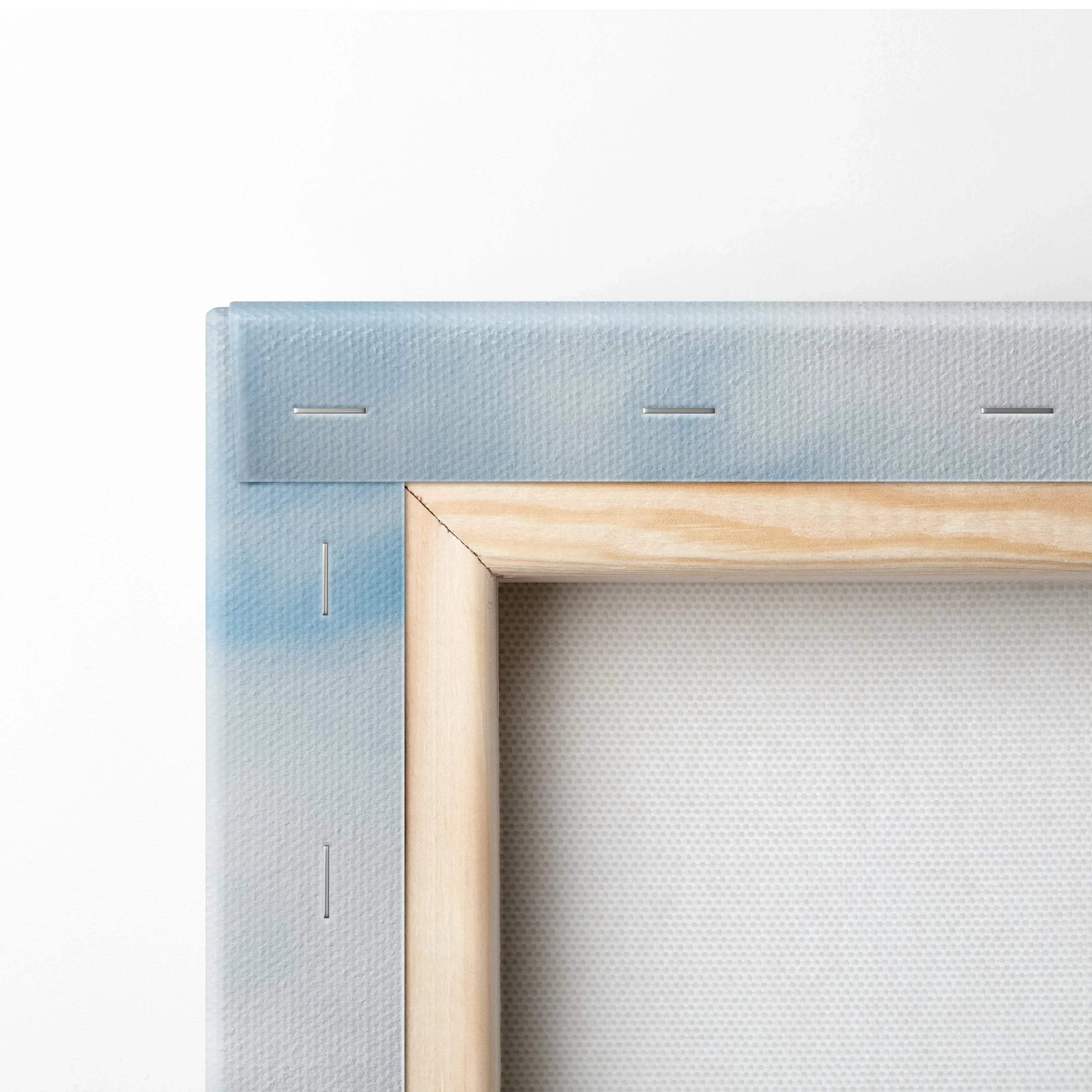Close-up of corner stretch on high-quality canvas art with wooden frame and precise staples for wall art display.