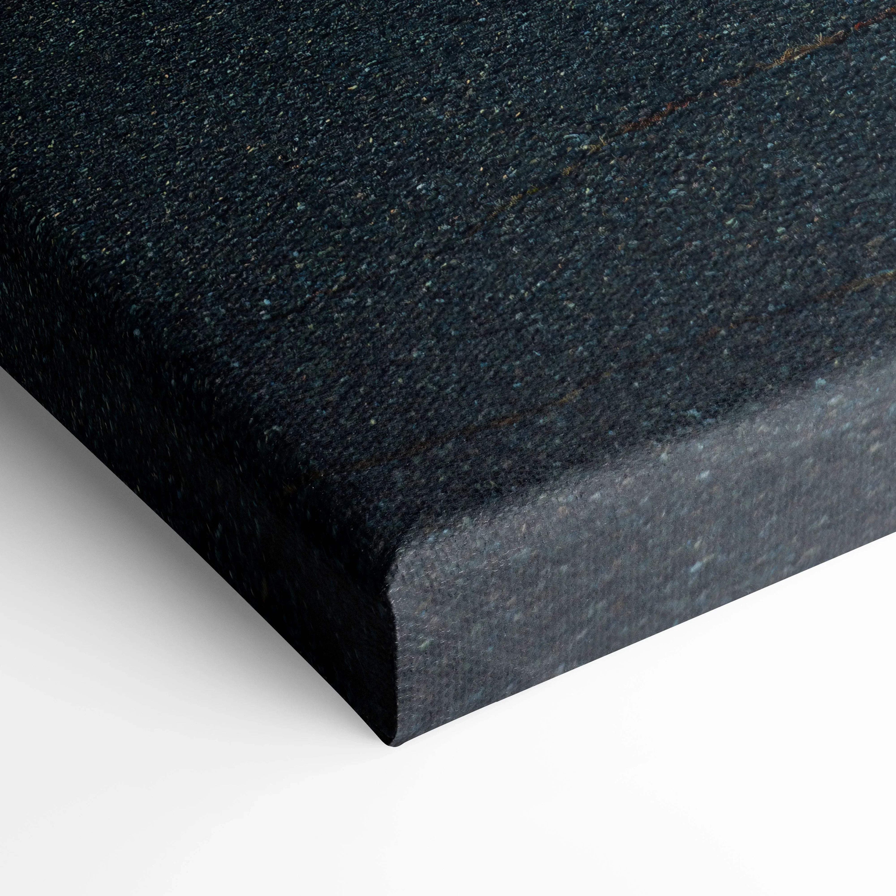 Close-up of dark textured canvas corner for wall art print with museum-quality finish.