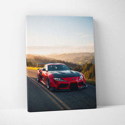Red Toyota Supra MK5 on winding road at sunset canvas wall art in vertical format.