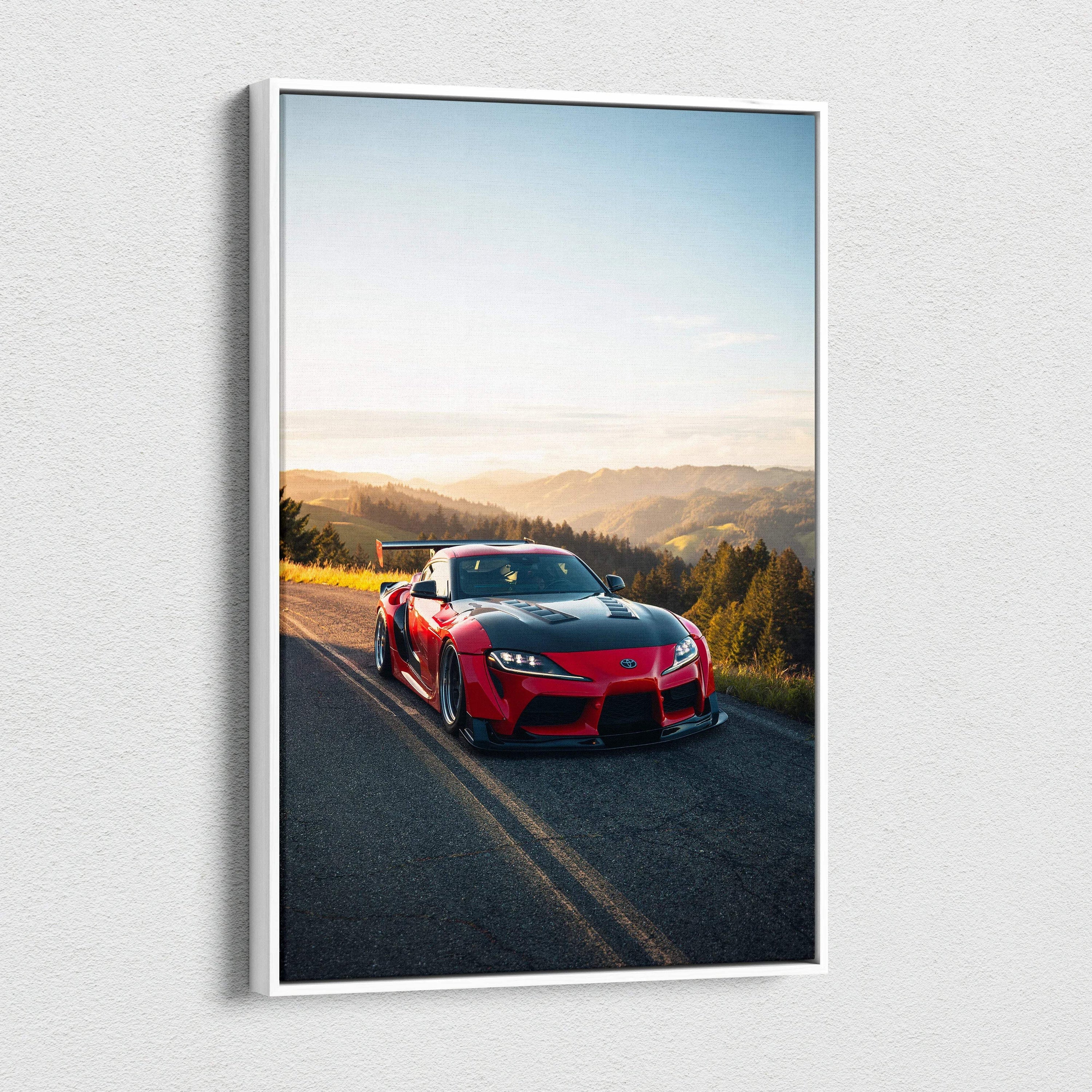Red Toyota Supra MK5 on scenic road at sunset vertical canvas wall art.