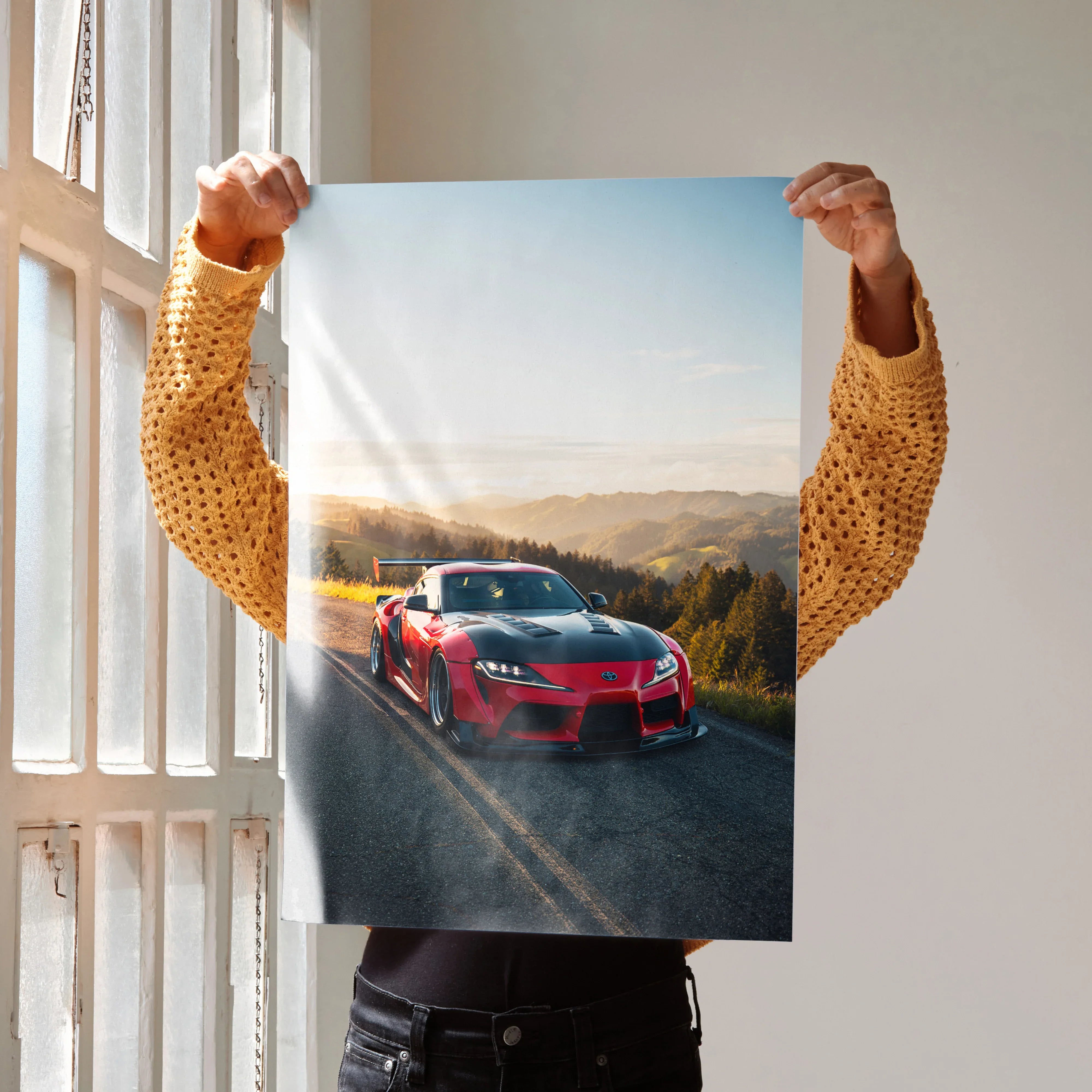 Toyota Supra Mk5 red sports car driving on sunset road poster wall art.