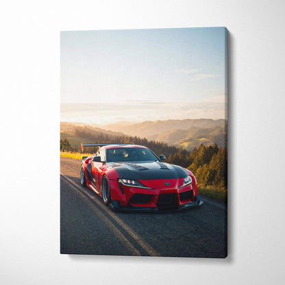 Red Toyota Supra MK5 on scenic road at sunset canvas wall art print.