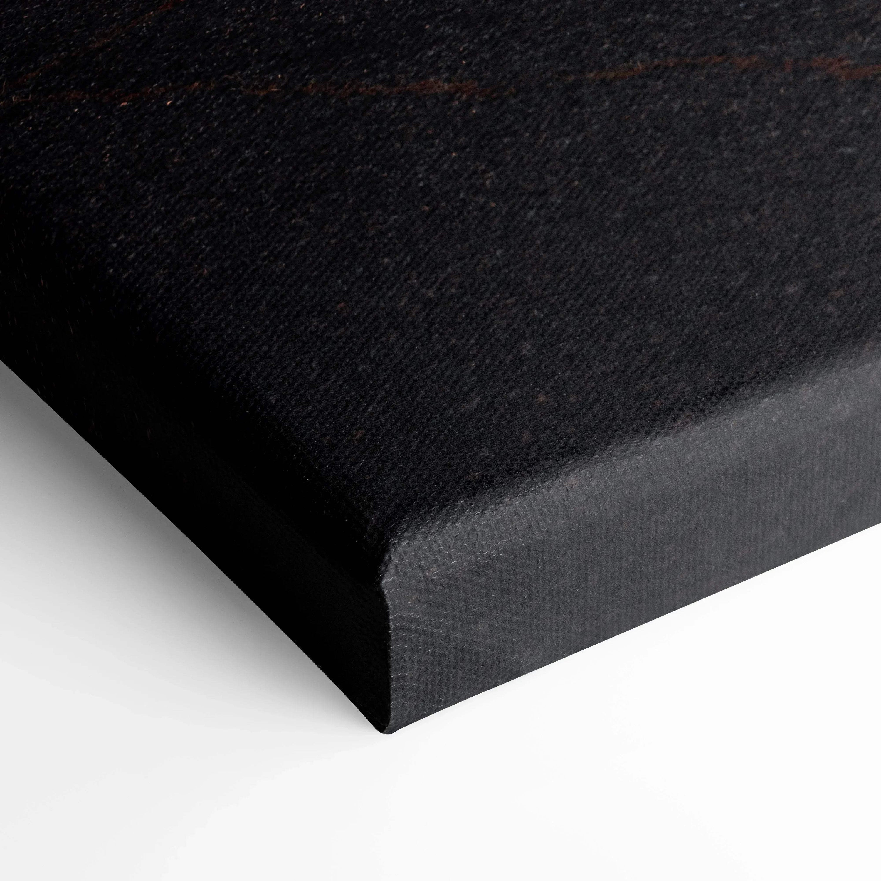 Close-up of black canvas corner with textured fabric wrap for wall art or car art print.