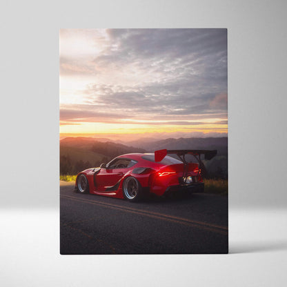 Toyota Supra Mk5 red sports car at sunset on canvas wall art with dramatic sky.