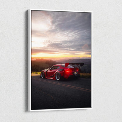 Red Toyota Supra MK5 parked on road at sunset with dramatic sky vertical canvas wall art.