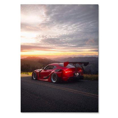 Poster of red Toyota Supra Mk5 JDM car at sunset on road, high-resolution wall art.