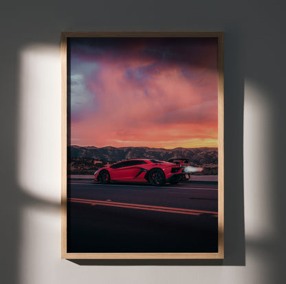 Lamborghini Aventador SVJ red hypercar driving at sunset wall art poster in wooden frame.