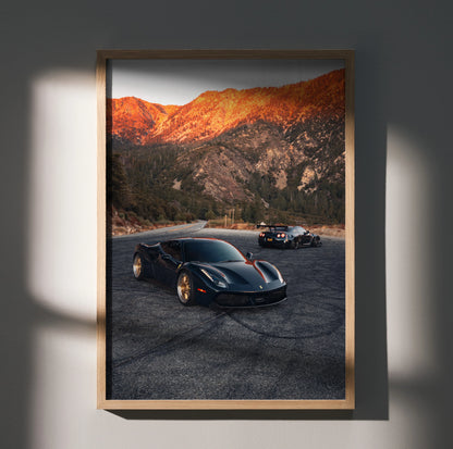 Ferrari 488 GTB and Nissan GTR R35 poster wall art with sunset mountain background in wooden frame.