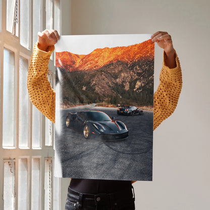 Poster of Ferrari 488 GTB and Nissan GTR R35 supercars against rocky mountain landscape wall art.