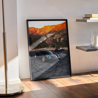Framed Ferrari 488 GTB and Nissan GTR R35 supercar poster with mountain backdrop wall art.
