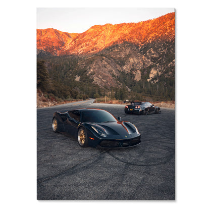 High-resolution poster of black Ferrari 488 GTB and Nissan GTR R35 supercars on mountain road wall art.