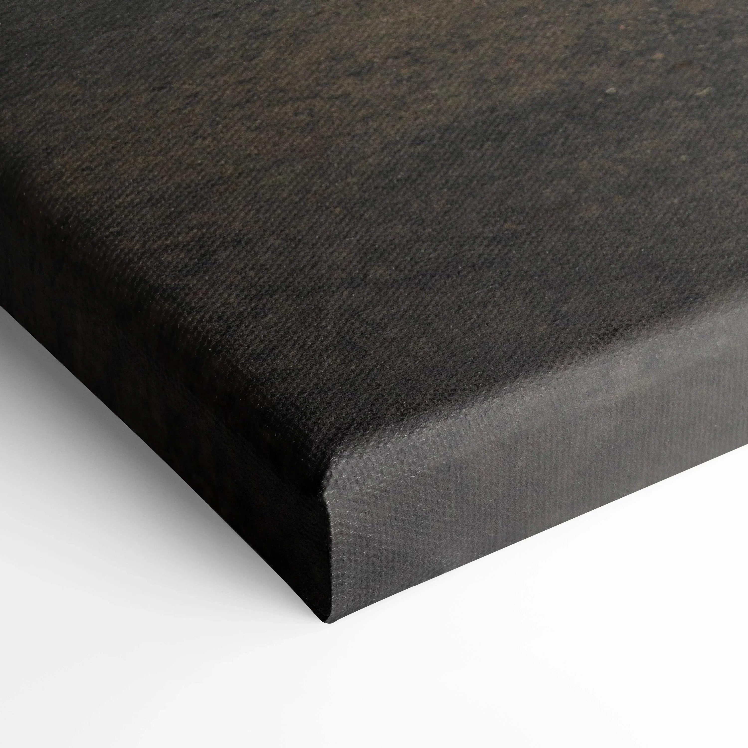 Black wrapped edge of vertical canvas wall art showcasing high-resolution Nissan GTR R35 car detail.