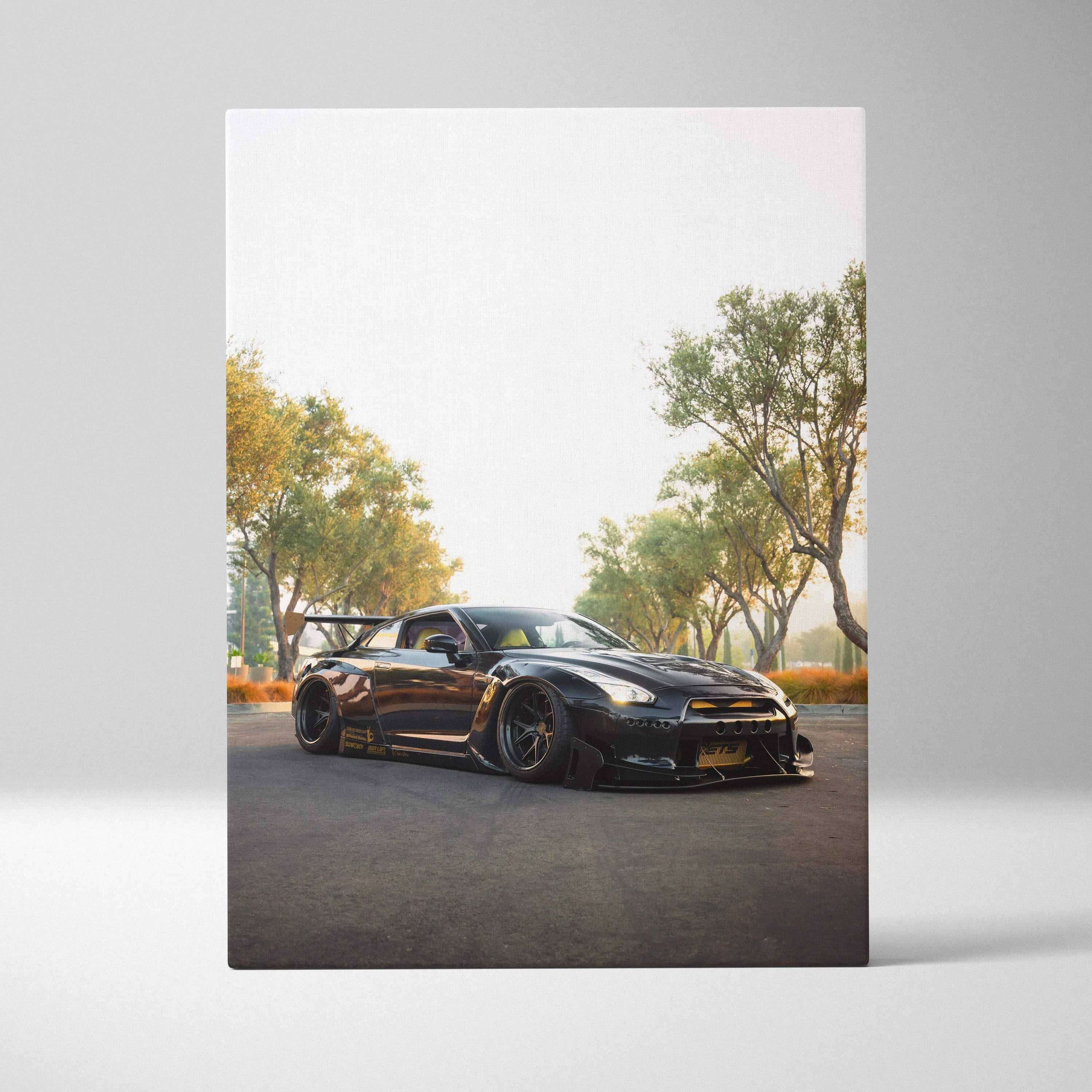 Nissan R35 GTR black sports car parked under trees on vertical canvas wall art.