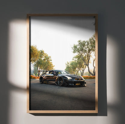 Nissan GT-R R35 black sports car on road at sunset poster wall art in wooden frame.